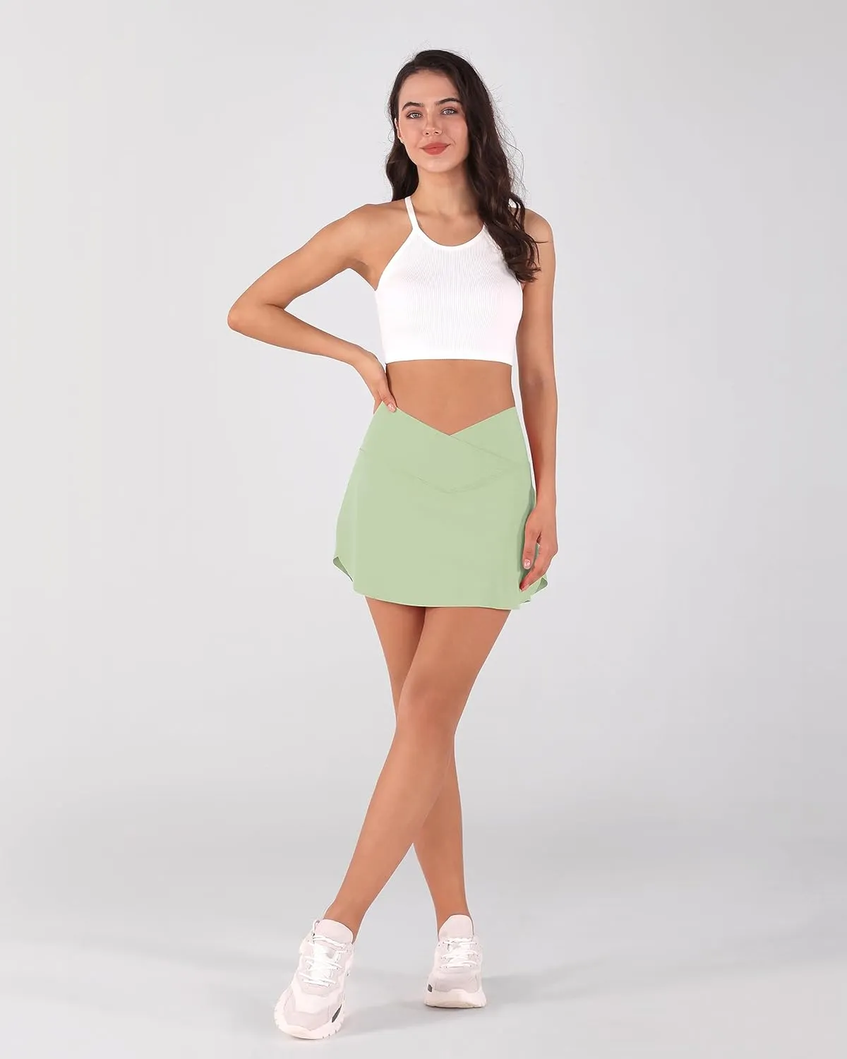ODODOS Women's Tennis Skirts with Pockets Crossover High Waist Built-in Shorts Athletic Golf Skorts